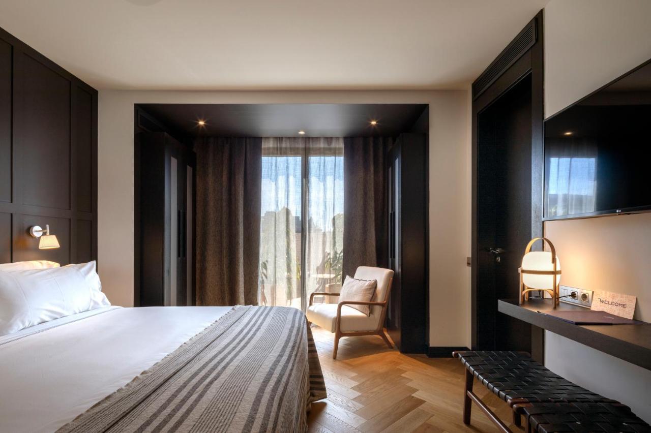 Hotel Casa Sagnier Barcelona Exterior foto A bedroom at the hotel